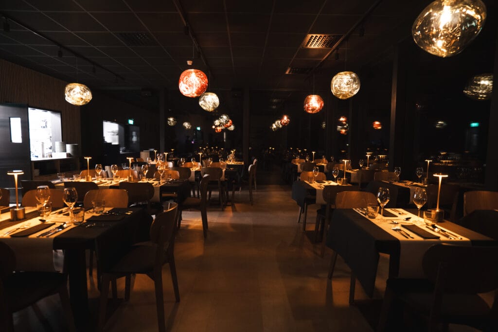 Invisible Restaurant dining room with a forest view