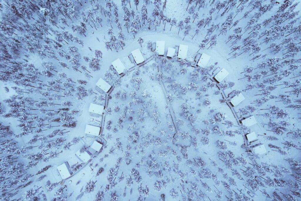 Invisible Forest Lodge from above, surrounded by Arctic forest