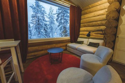 Lounge corner facing the snowy spruces