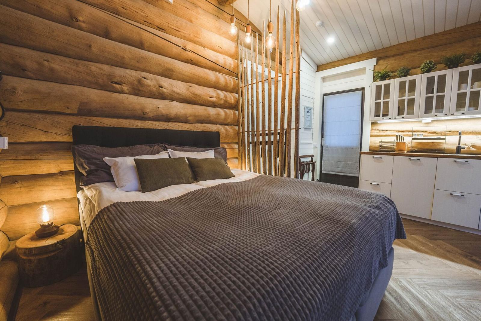 Bedroom with log walls