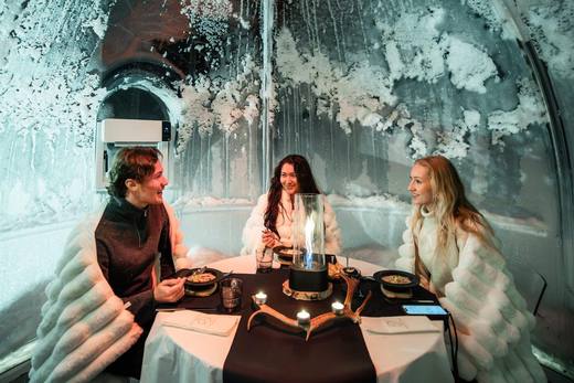 Dinner inside a glass igloo